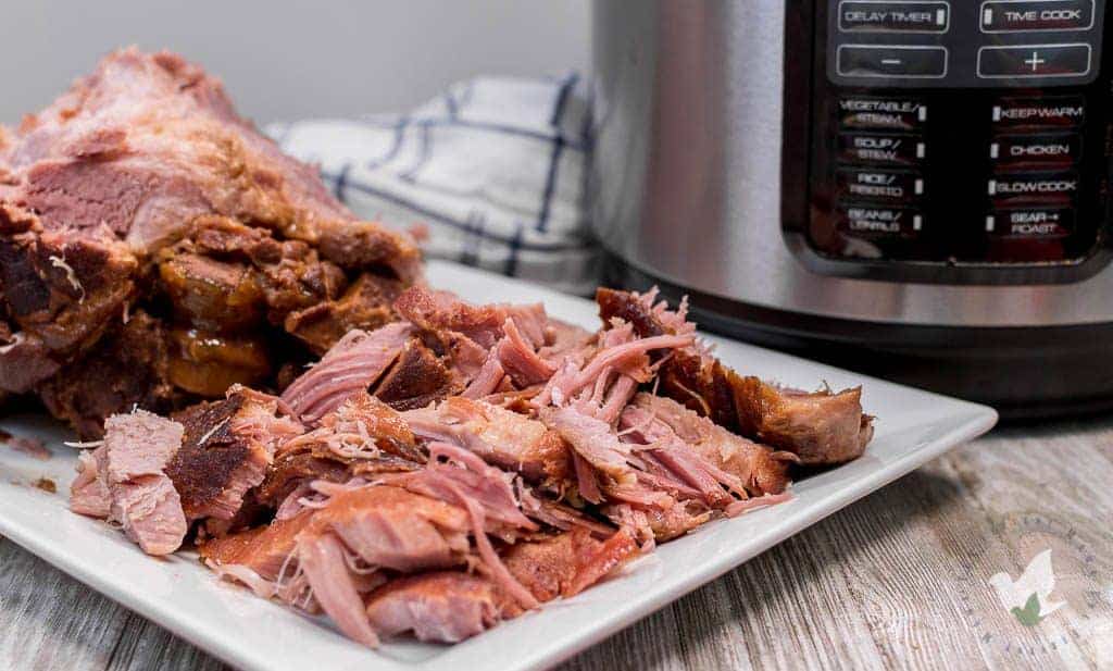 Pressure Cooker Ham that is fall apart Tender and so sweet: The Fervent Mama - If you're looking to change up your Holiday Dinner Menu Plan this year, think twice about the spiral ham and go ahead and make this Pressure Cooker Ham! 