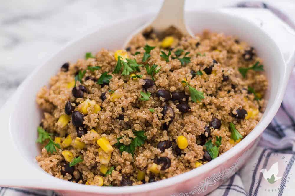 Pressure Cooker Black Bean and Corn Quinoa Bowls- The Fervent Mama: Easy, quick, and delicious is always the way to go. These Pressure Cooker Black Bean and Corn Quinoa Bowls will be the next thing you add to your menu plan! A simple dish with a Mexican flare to give your supper a little fiesta! 