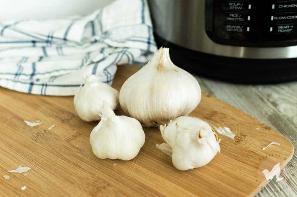 Pressure Cooker Roasted Garlic - The Fervent Mama: This pressure cooker roasted garlic will knock your socks off. No more waiting hours for oven-roasted garlic, you can have it in minimal time and I think it tastes even better than I give it credit for. And look, I give it a lot of credit.