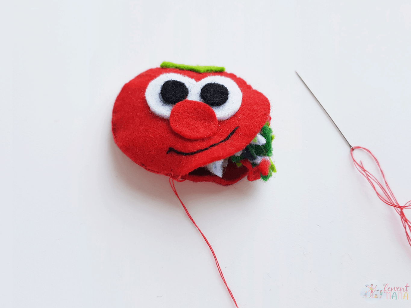 Photo showing how to stuff a plush vegetable toy.