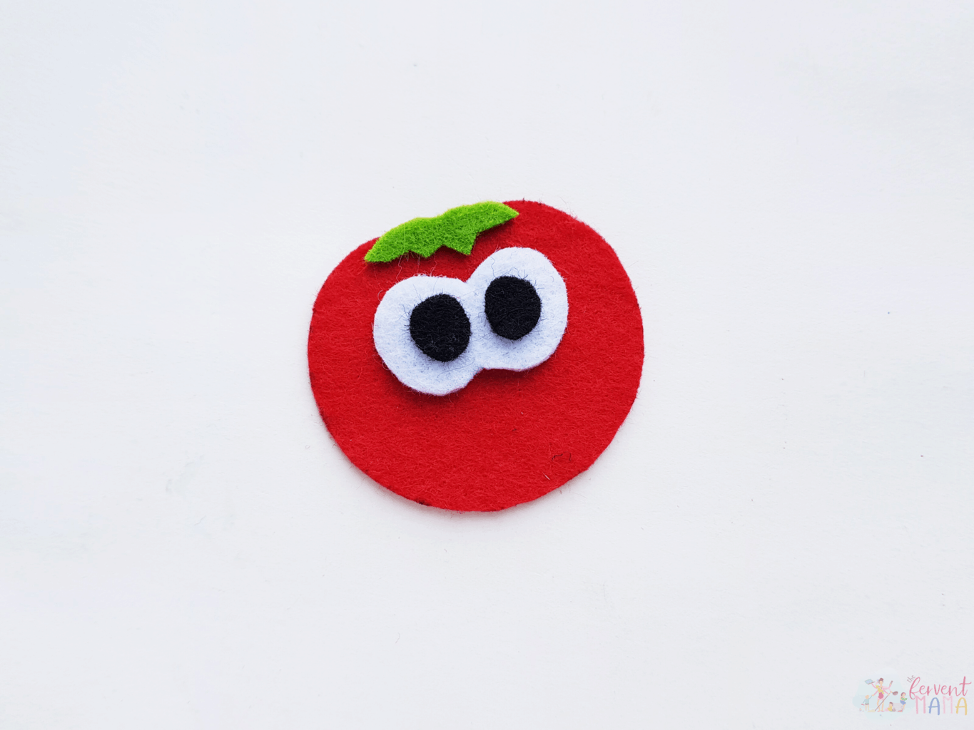 VeggieTales inspired character Bob the Tomato made from felt but missing his nose and smile.