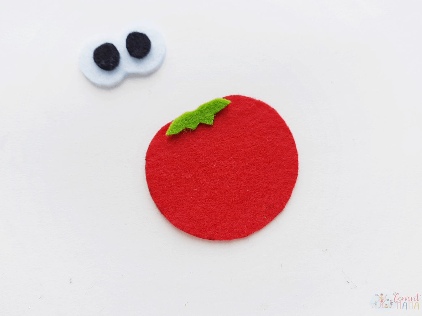 Bob the Tomato inspired felt pieces (red circle, white and black eyes, green stem)